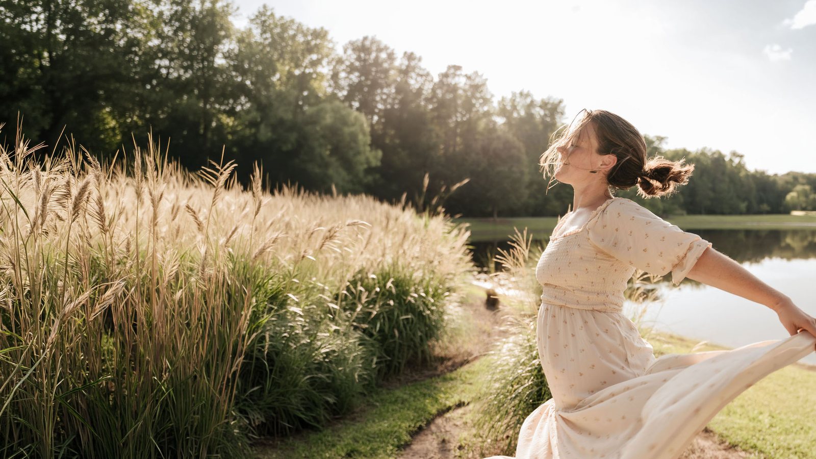 Our founder dancing by the water in the late afternoon light